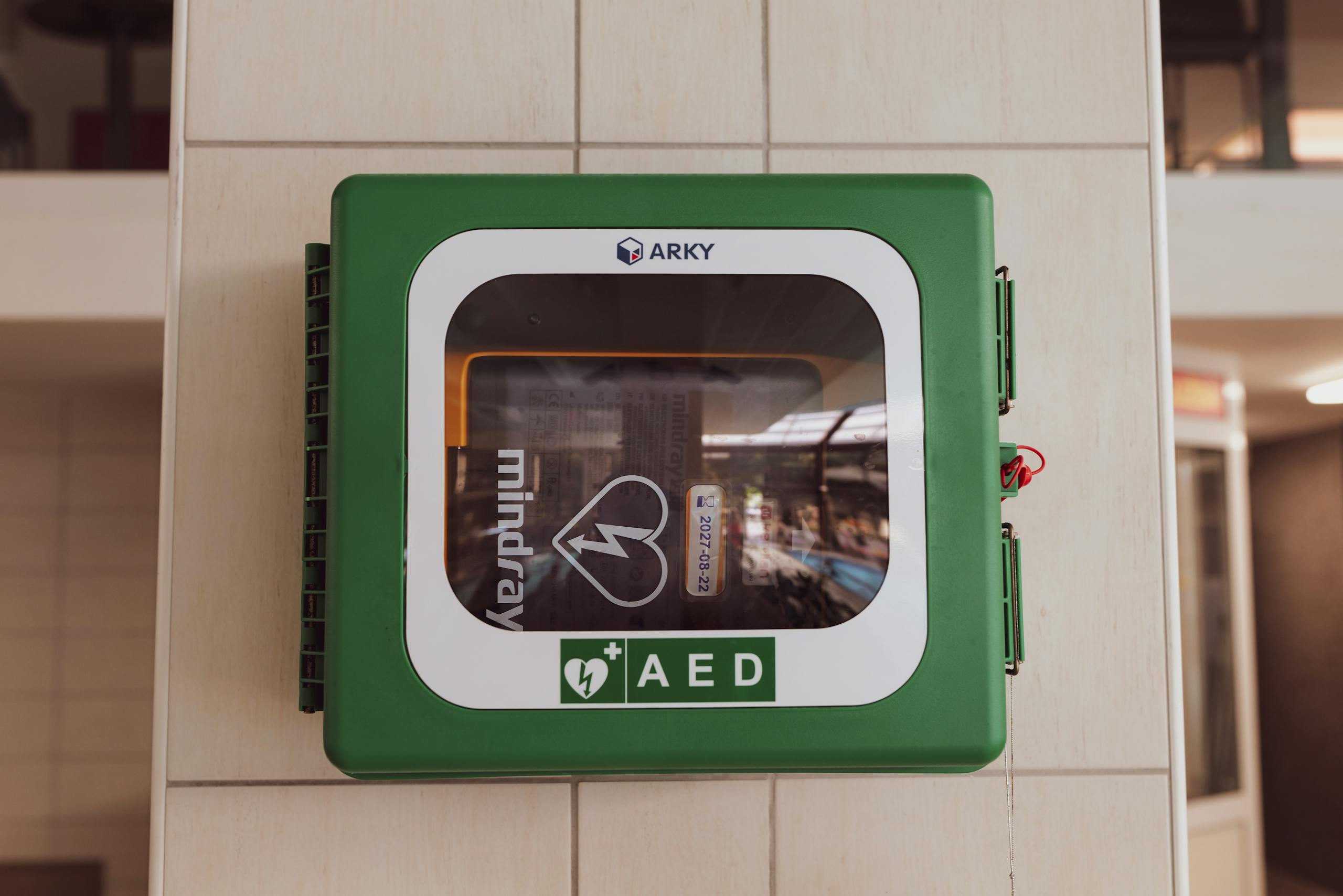 A close-up shot of a wall-mounted AED device in Stubičke Toplice, Croatia.